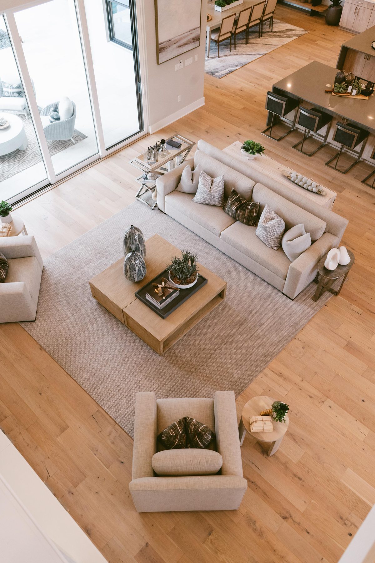 Remodeled living room with new hardwood flooring installed by Berton & Acker Flooring Co.