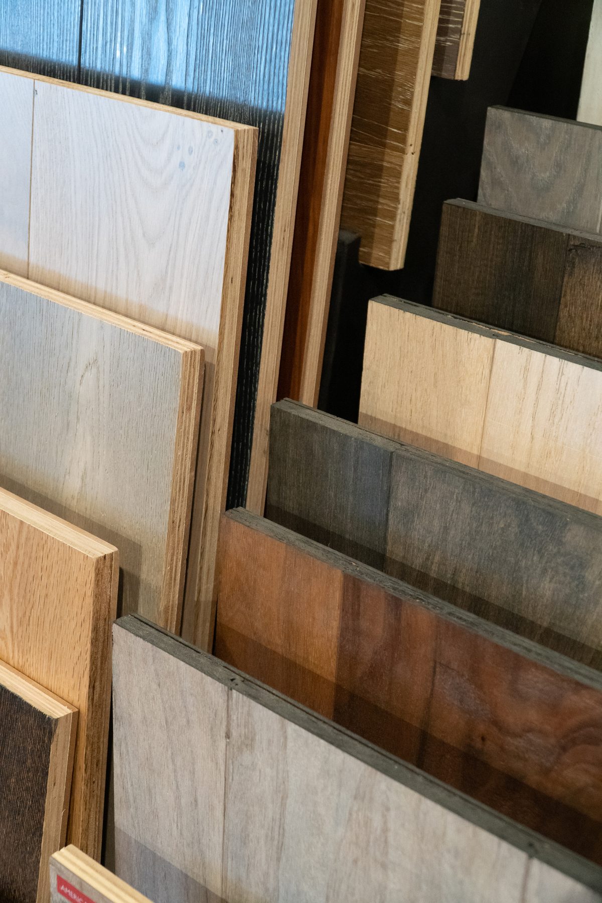 Laminate and wood-look plank samples for a Berton & Acker material selection